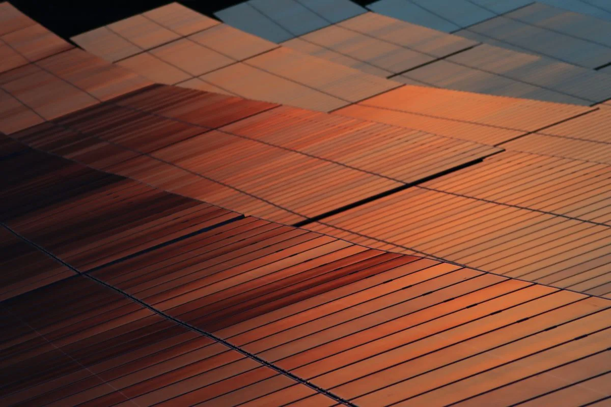Solar photovoltaic panels; illustrative solar-installation photograph